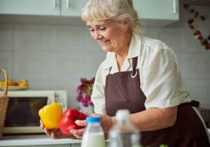 Caregiver doing meal preparation service