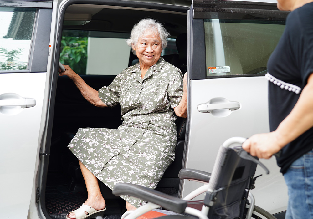 senior woman utilizing transportation services