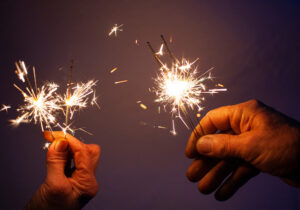 senior wellness tips, people holding sparklers